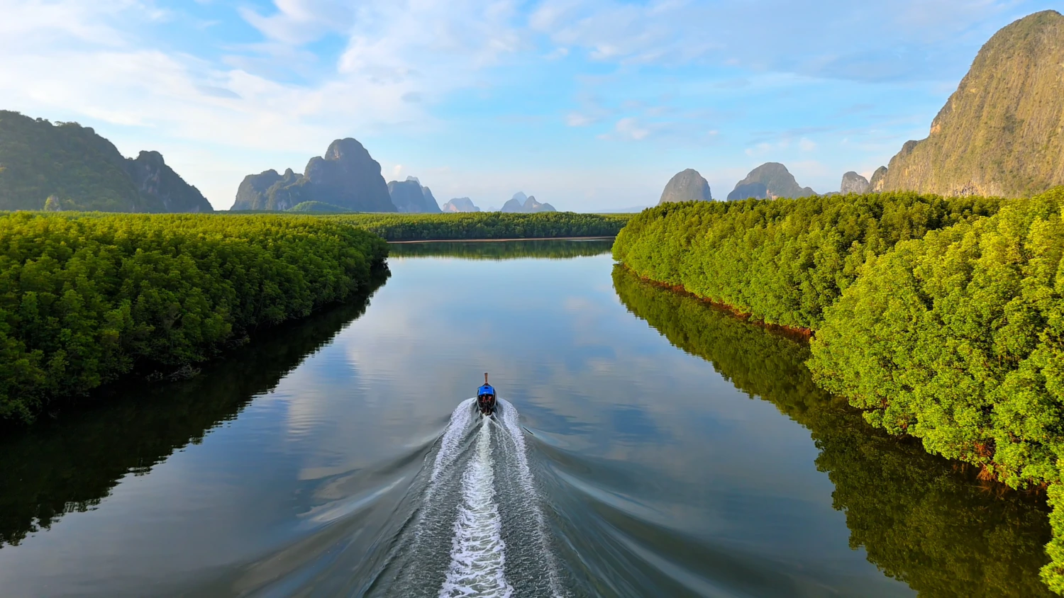 The best things to do in Khao Lak with kids - Private longtail boat tour through Phang Nga Bay